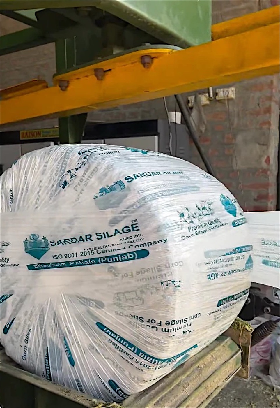 A freshly wrapped Sardar Silage bale on the baler