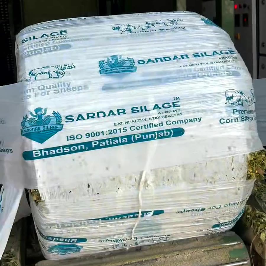 A Sardar Silage bale in the teal wrap made for sheep